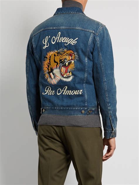 gucci tiger denim jacket.